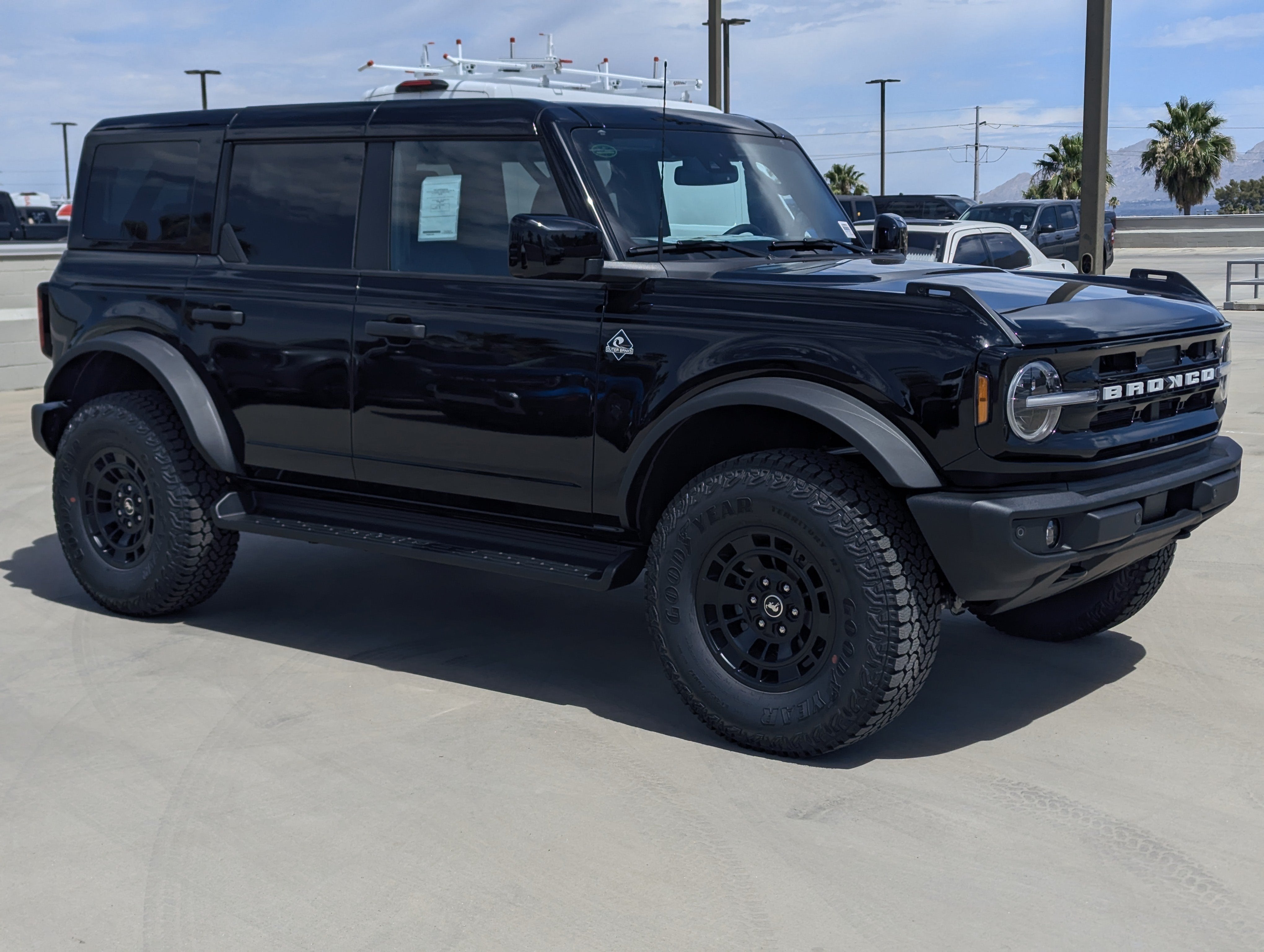 2026 Ford Bronco Outer Banks in Shadow Black — front three-quarter view