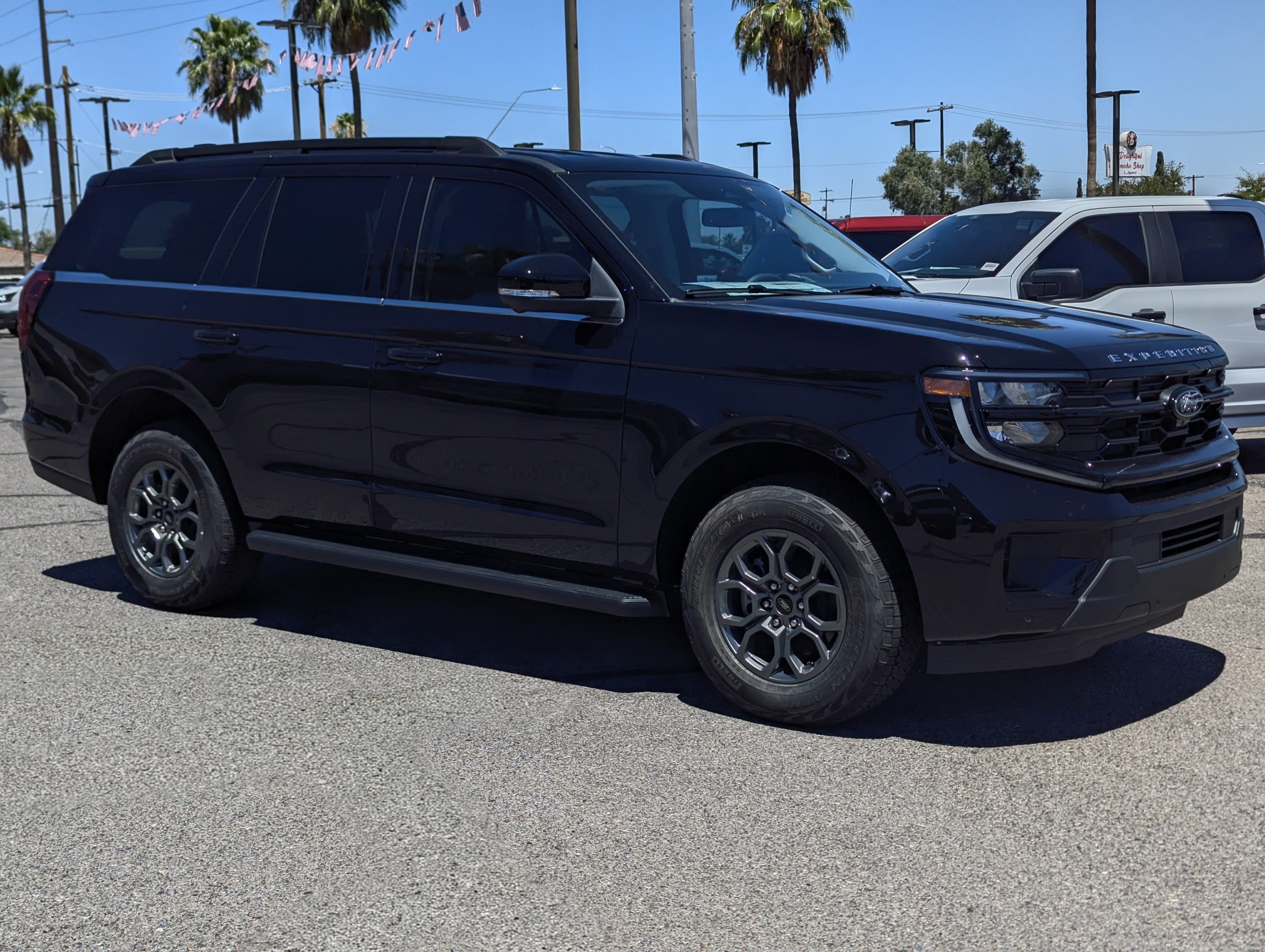 2026 Ford Expedition Active in Agate Black Metallic — front three-quarter view