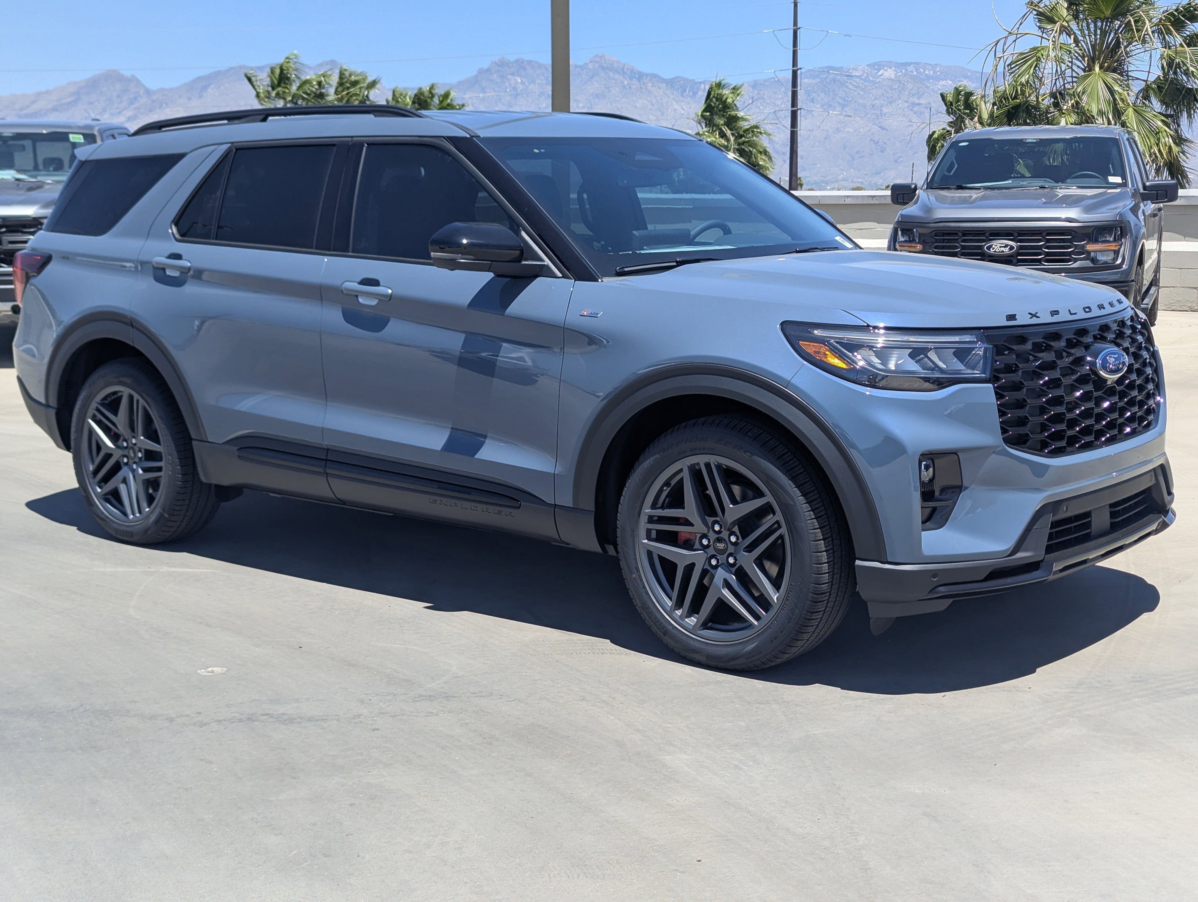2026 Ford Explorer ST-Line in Vapor Blue Metallic — front three-quarter view