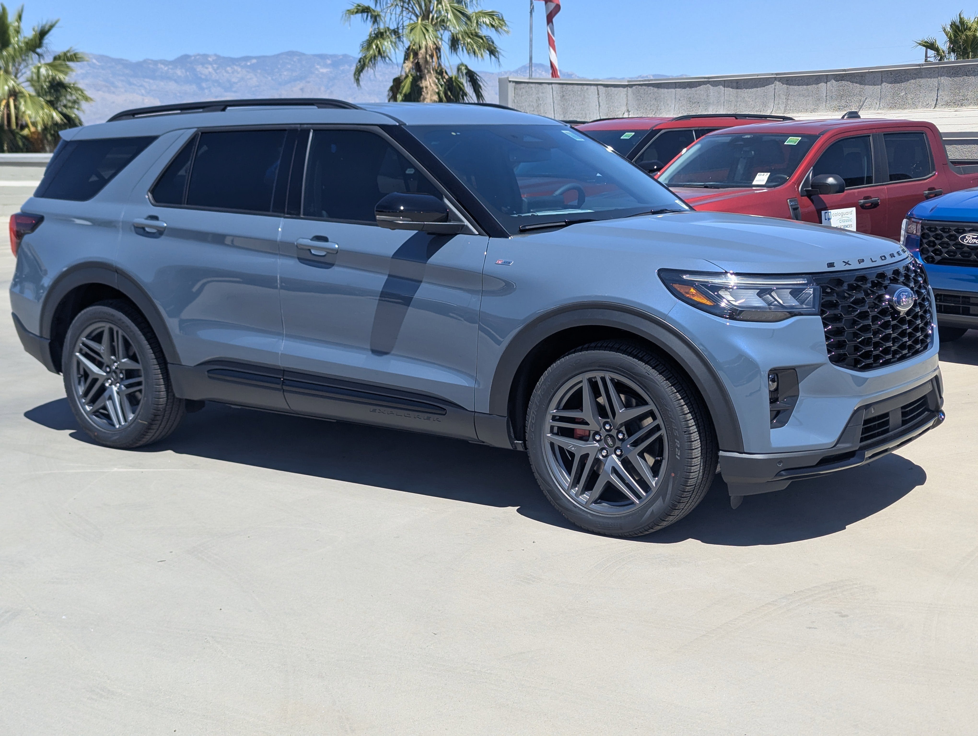 2026 Ford Explorer ST-Line in Vapor Blue Metallic — front three-quarter view
