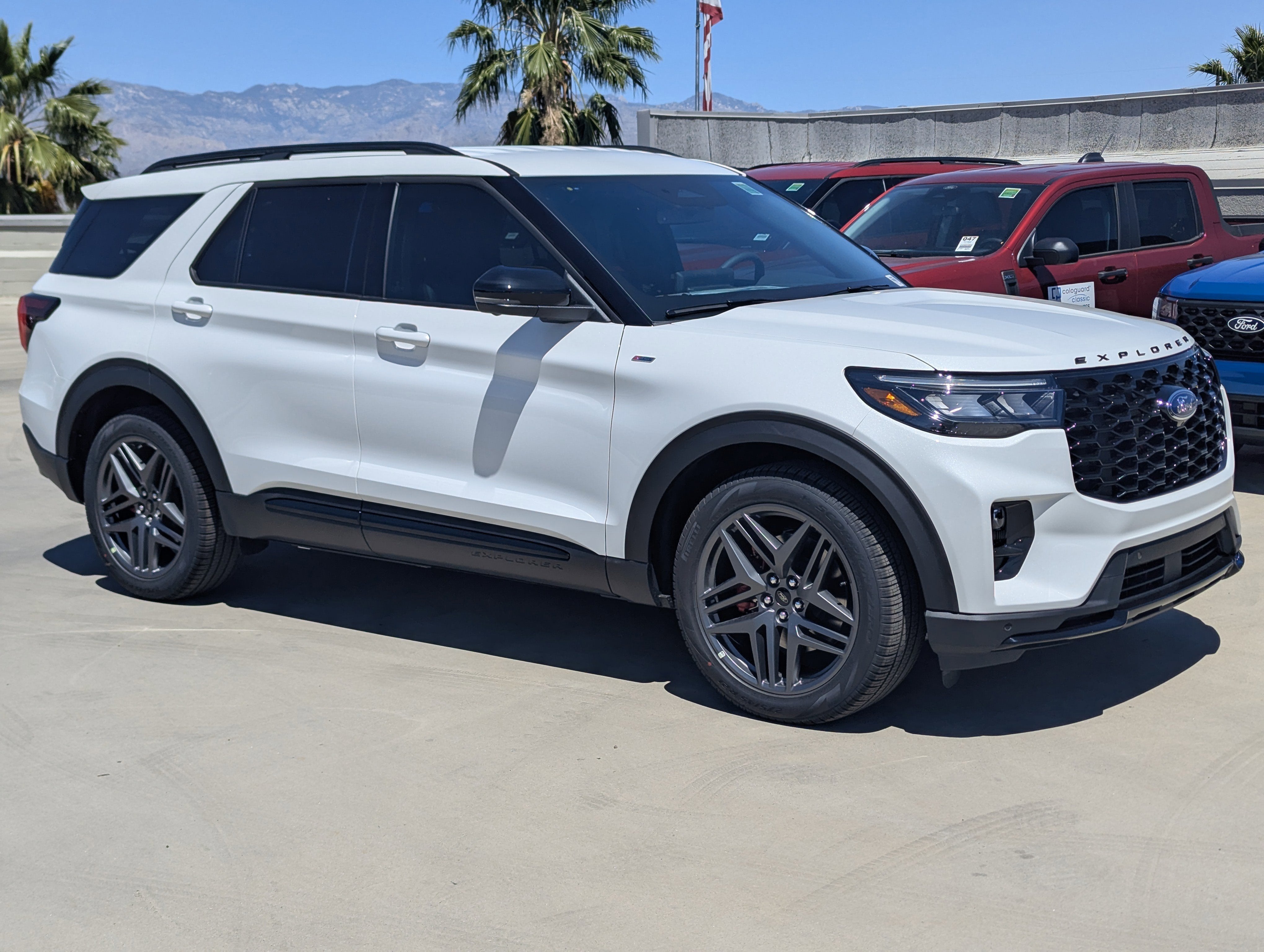 2026 Ford Explorer ST-Line in Star White Metallic Tri-Coat — front three-quarter view