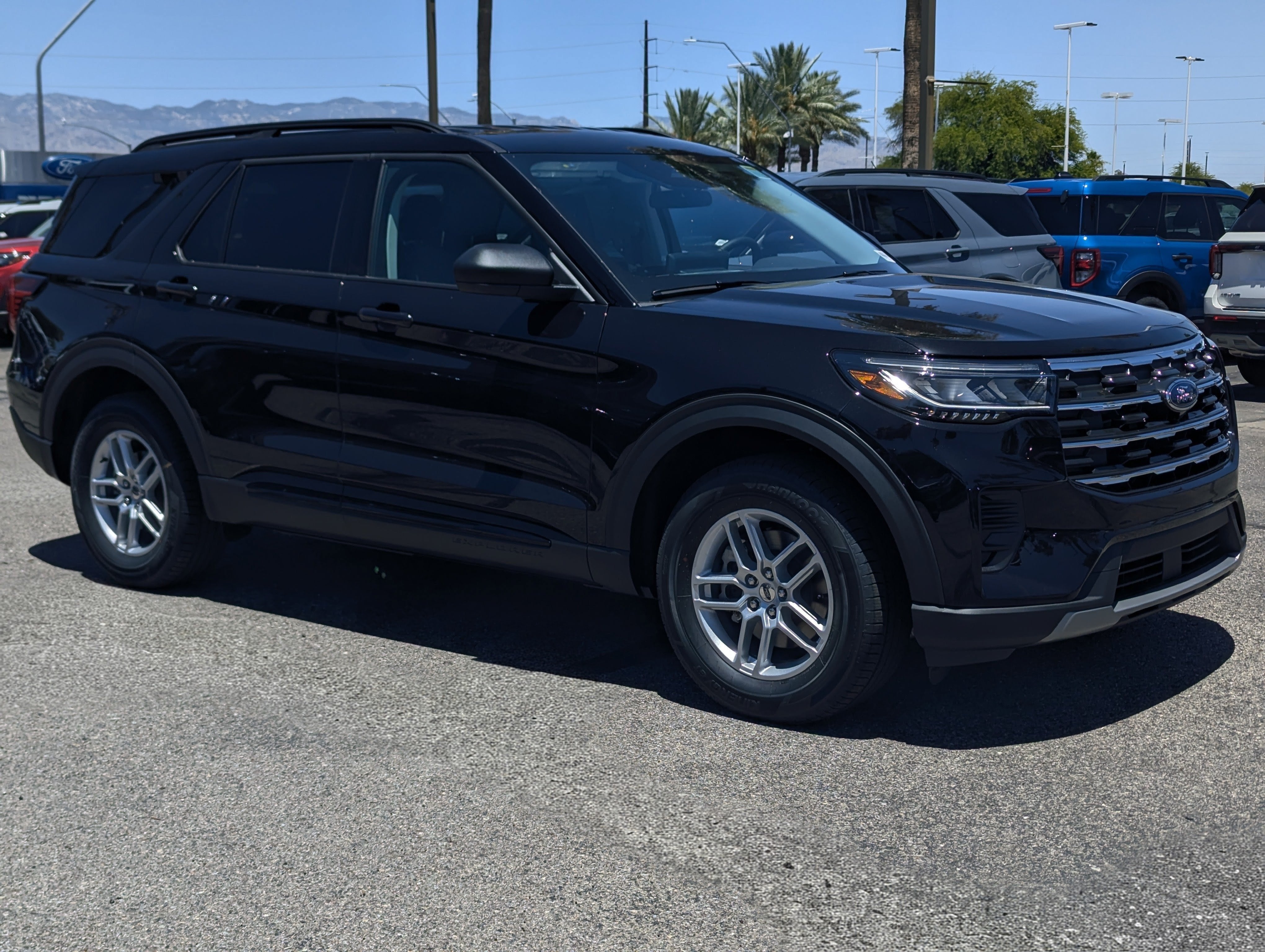 2026 Ford Explorer Active in Agate Black Metallic — front three-quarter view