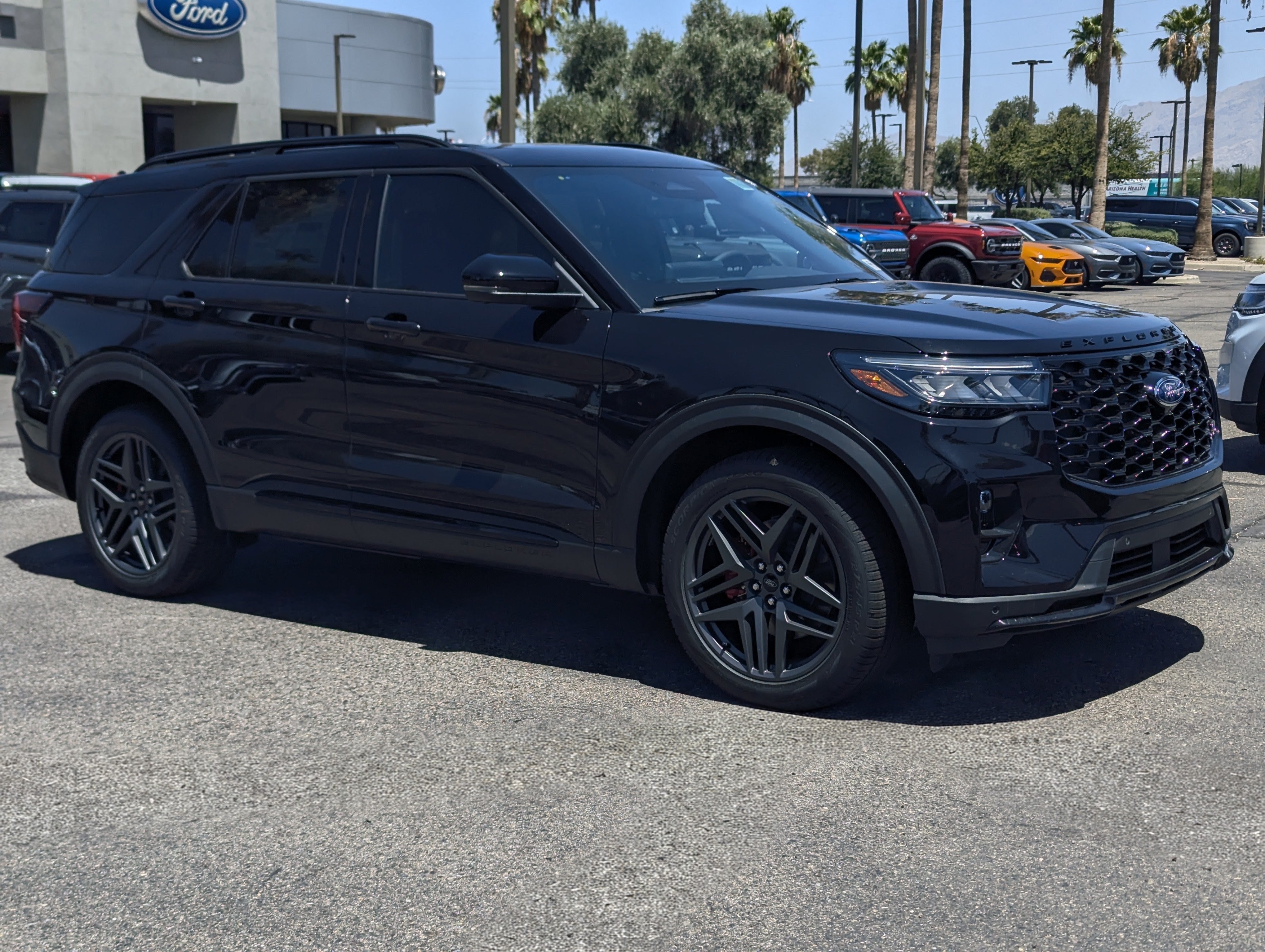 2026 Ford Explorer ST in Agate Black Metallic — front three-quarter view