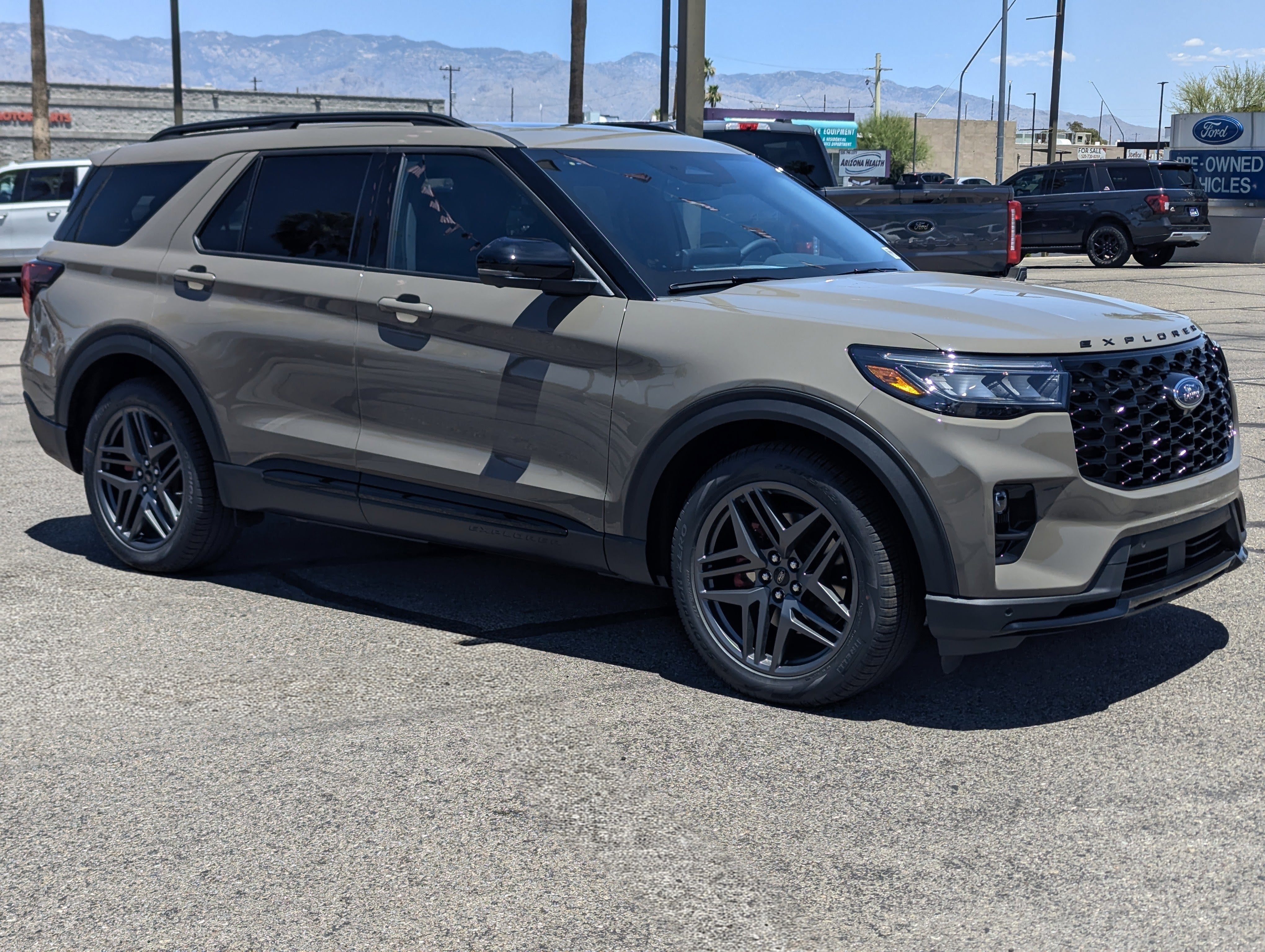 2026 Ford Explorer ST in Marsh Gray — front three-quarter view