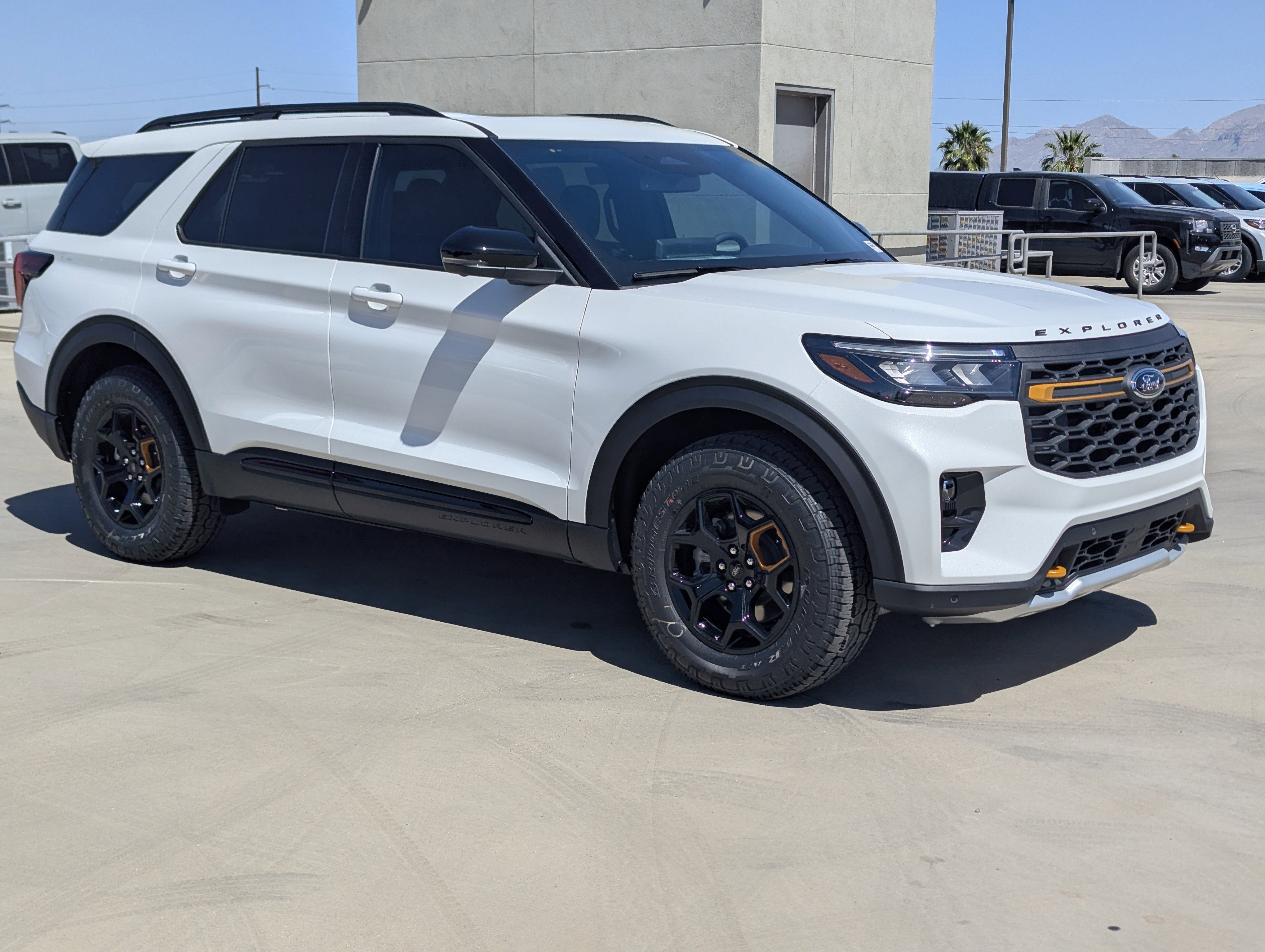 2026 Ford Explorer Tremor in Star White Metallic Tri-Coat — front three-quarter view