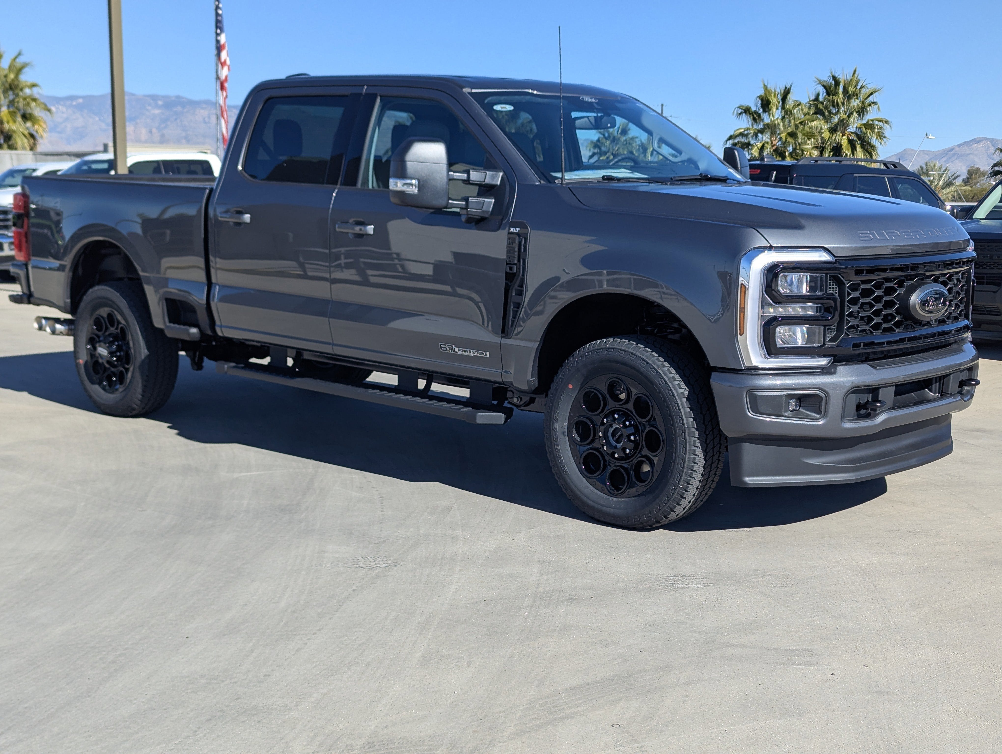 2026 Ford Super Duty F-250 XLT in Carbonized Gray Metallic — front three-quarter view