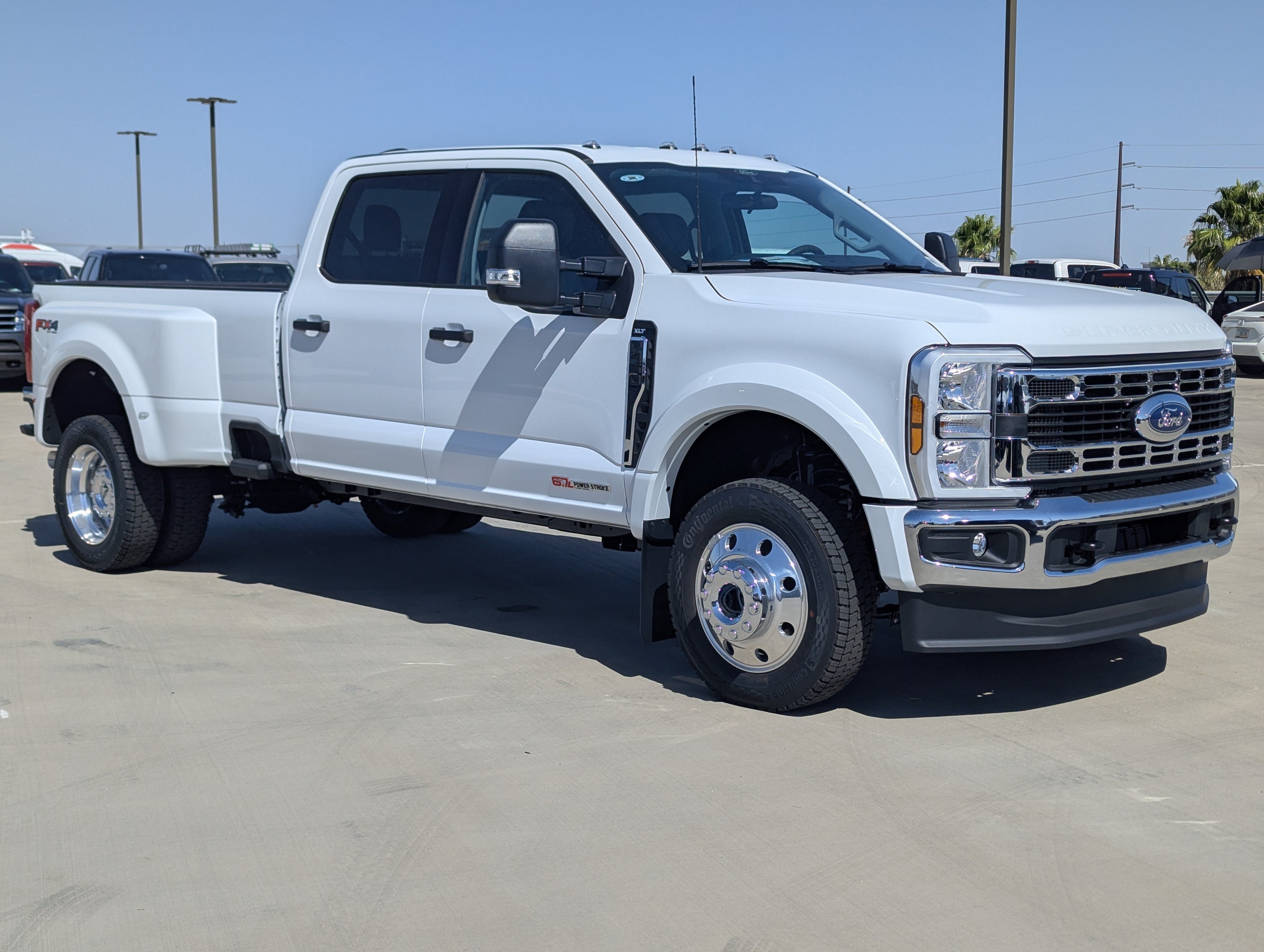 2026 Ford Super Duty F-450 XLT in Oxford White — front three-quarter view