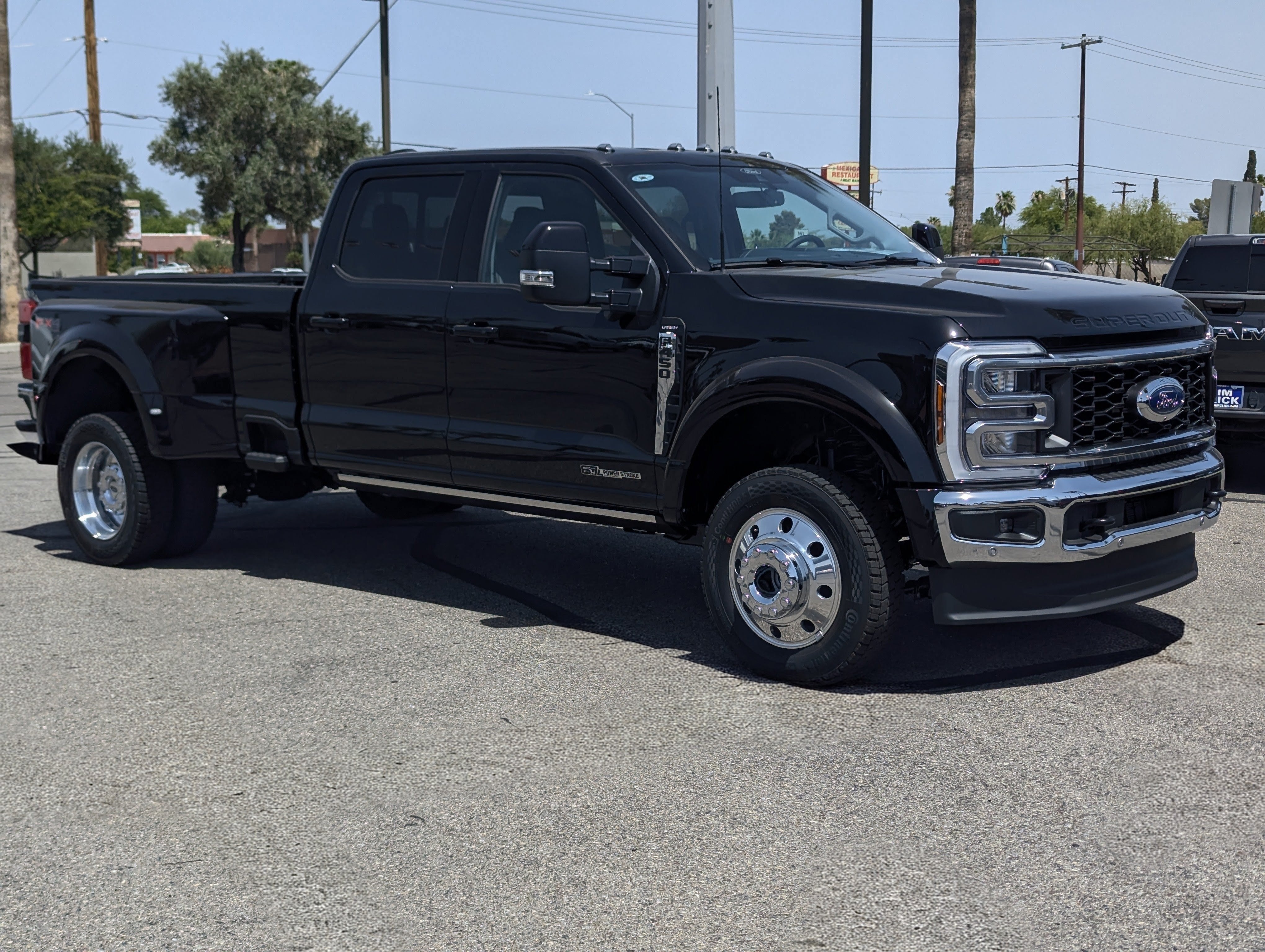 2026 Ford Super Duty F-450 Lariat in Agate Black Metallic — front three-quarter view