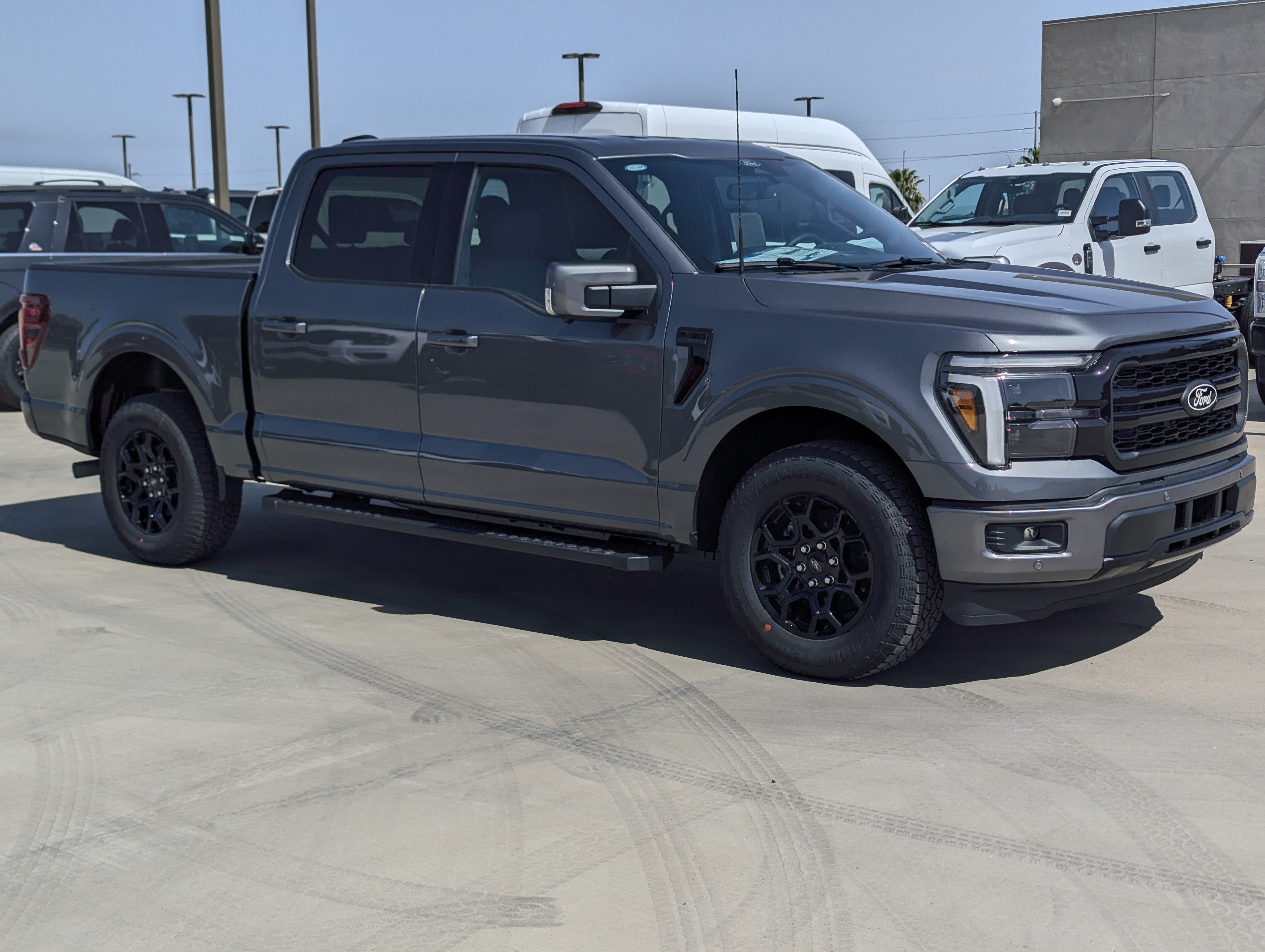 2026 Ford F-150 Lariat in Carbonized Gray Metallic — front three-quarter view