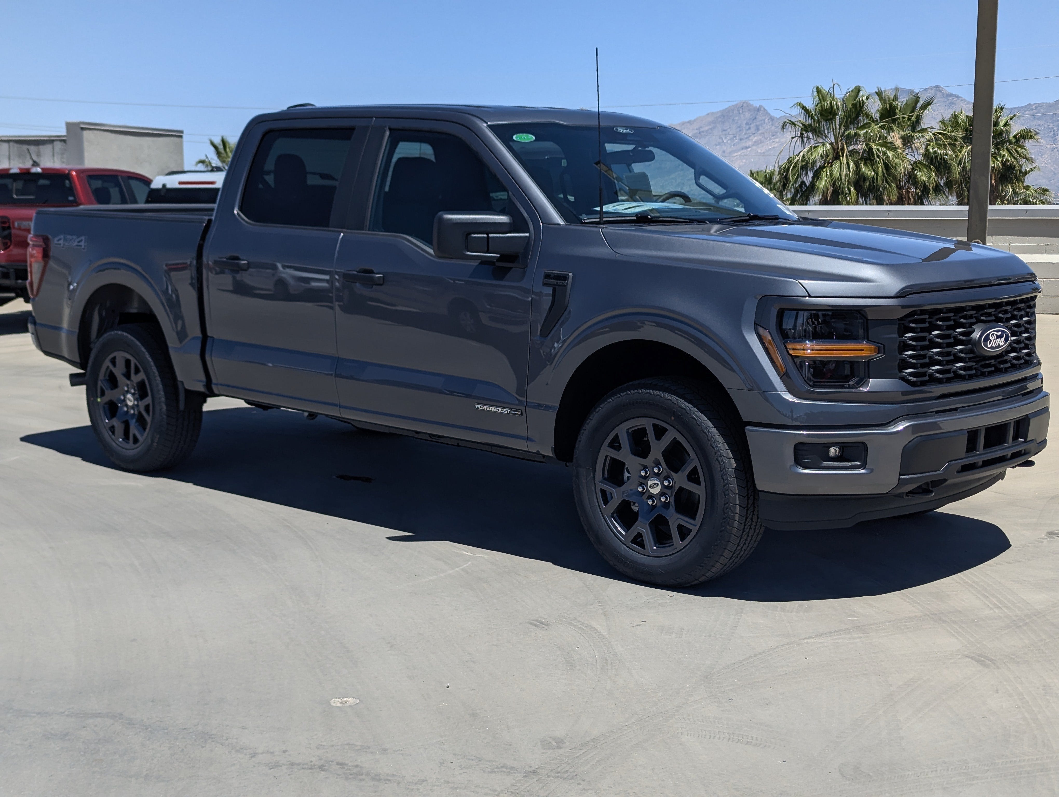 2026 Ford F-150 STX in Carbonized Gray Metallic — front three-quarter view