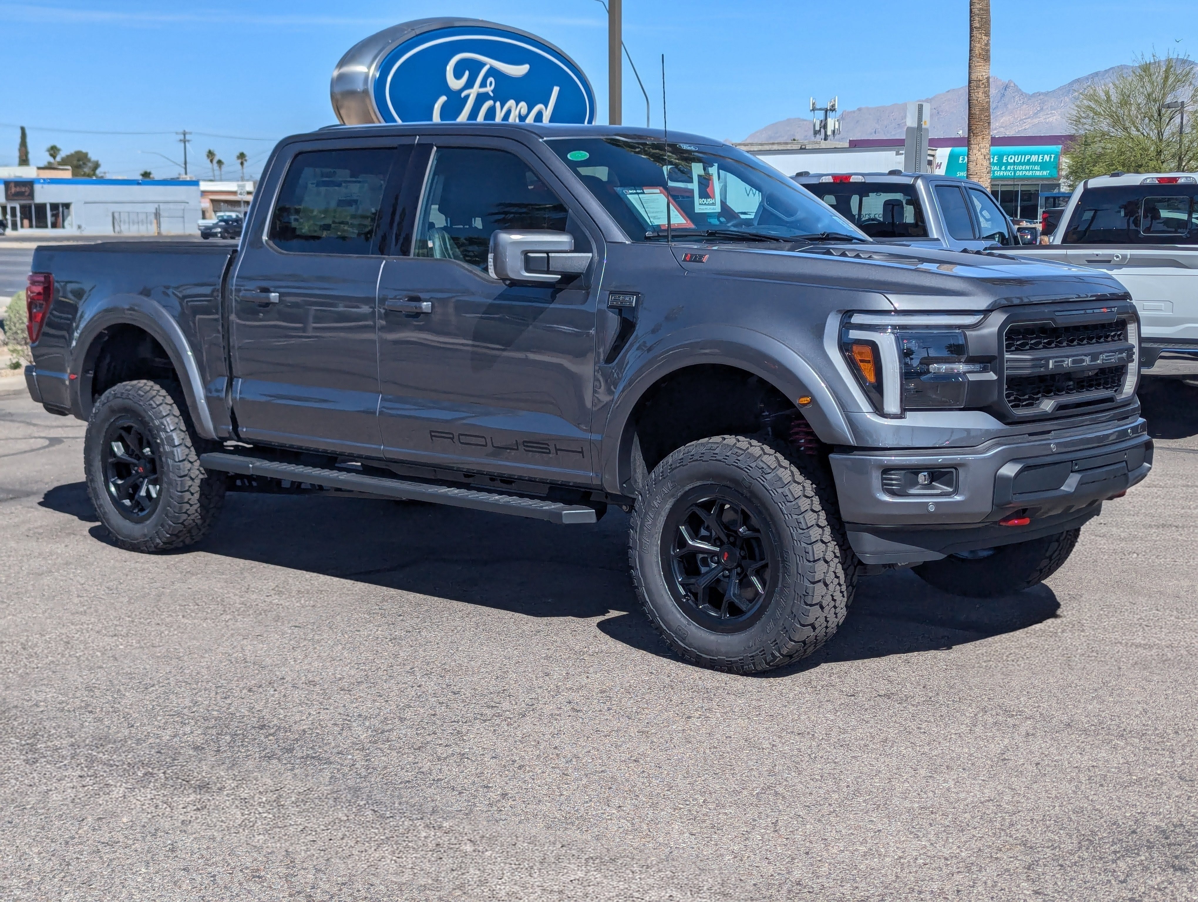 2026 Ford F-150 Lariat in Carbonized Gray Metallic — front three-quarter view