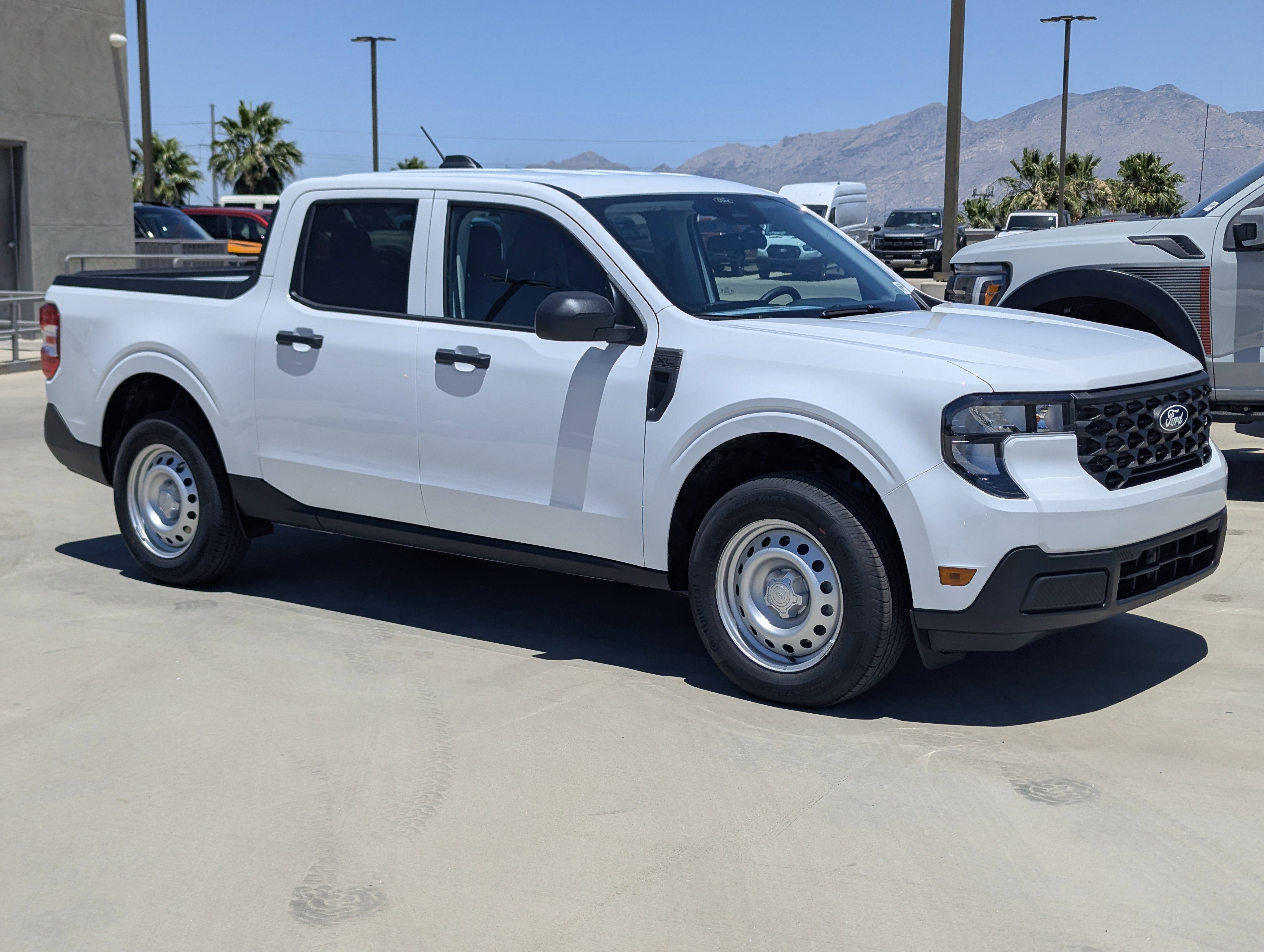2026 Ford Maverick XL in Oxford White — front three-quarter view