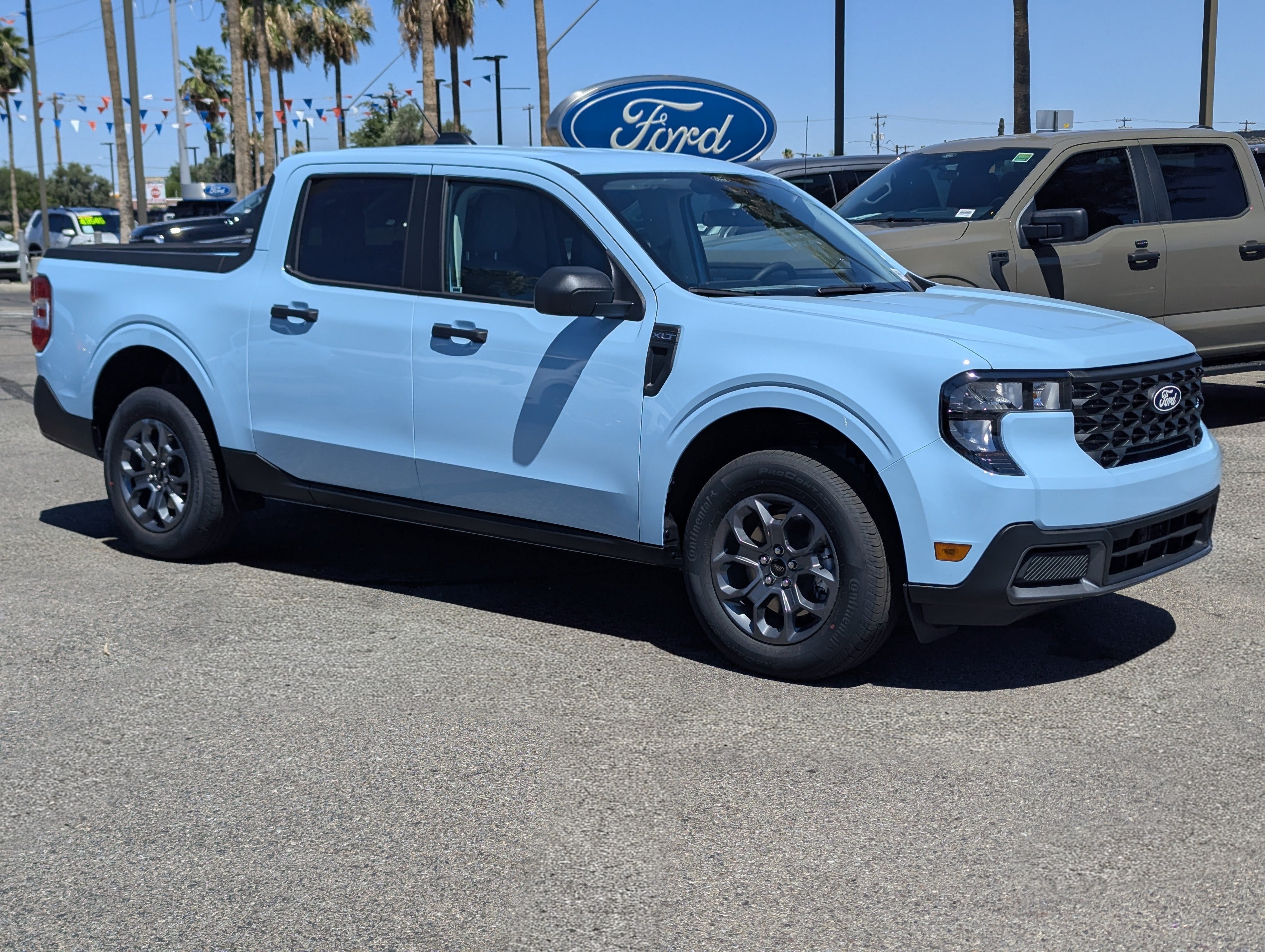 2026 Ford Maverick XLT in Light Blue — front three-quarter view