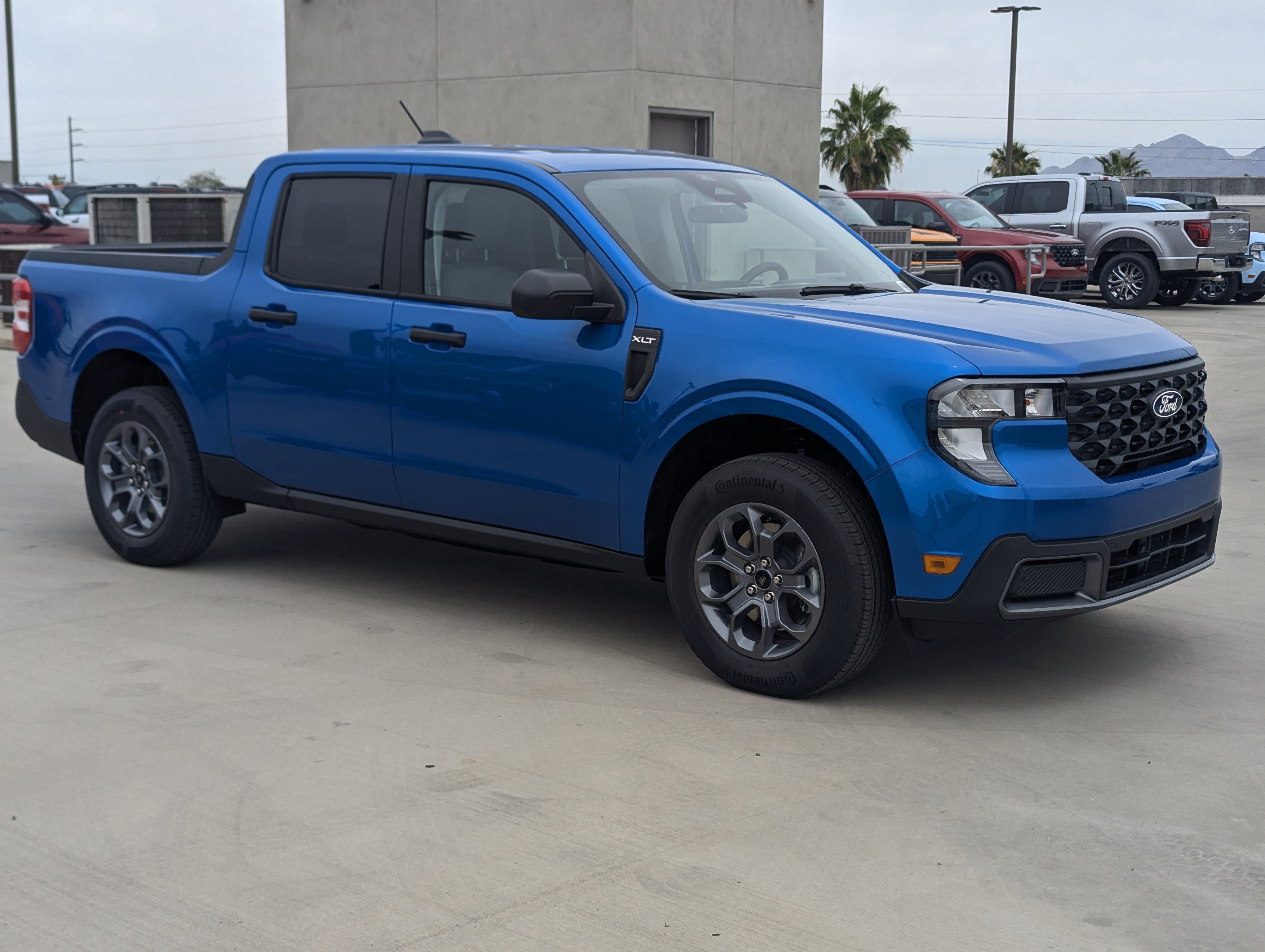 2026 Ford Maverick XLT in Velocity Blue — front three-quarter view
